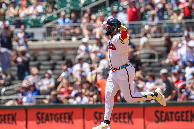 May 20, 2024; Cumberland, Georgia, USA; Atlanta Braves designated hitter Marcell Ozuna (20) reacts after hitting a home run against the San Diego Padres during the third inning at Truist Park. Mandatory Credit: Dale Zanine-USA TODAY Sports