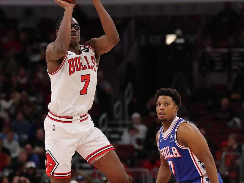 CHICAGO, ILLINOIS - DECEMBER 08: Jalen Smith #7 of the Chicago Bulls shoots a half court three pointer as time expires in the third quarter against the Philadelphia 76ers at the United Center on December 08, 2024 in Chicago, Illinois. NOTE TO USER: User expressly acknowledges and agrees that, by downloading and or using this photograph, User is consenting to the terms and conditions of the Getty Images License Agreement.  (Photo by Michael Reaves/Getty Images)