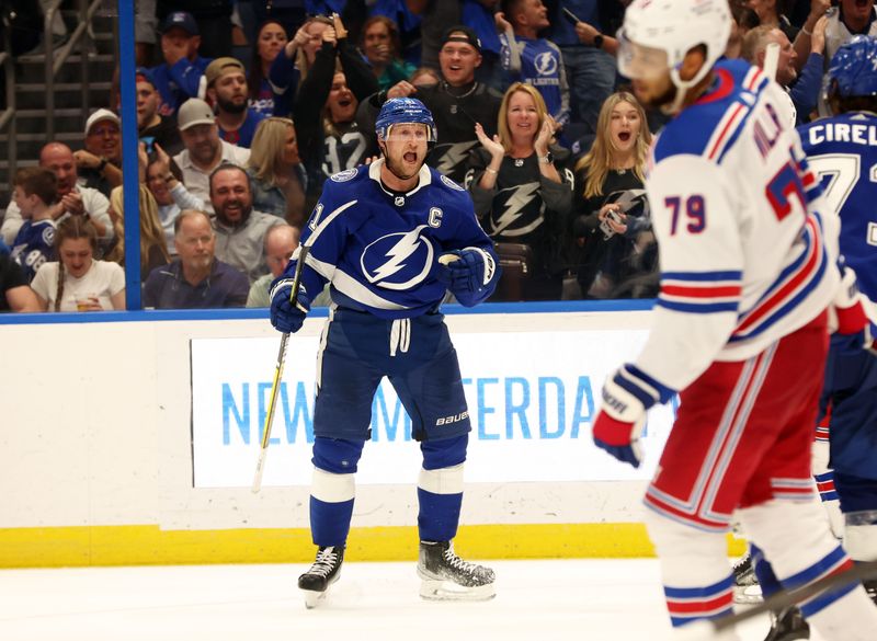 Mar 14, 2024; Tampa, Florida, USA; Tampa Bay Lightning center Steven Stamkos (91) celebrates after he scores a goal against the New York Rangers during the third period at Amalie Arena. Mandatory Credit: Kim Klement Neitzel-USA TODAY Sports