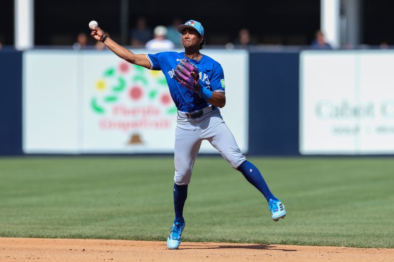 Feb 28, 2026; Tampa, Florida, USA; Toronto Blue Jays shortstop Arjun Nimmala (18) throws to first fro an out against the New York Yankees in the fourth inning during spring training at George M. Steinbrenner Field. Mandatory Credit: Nathan Ray Seebeck-Imagn Images
