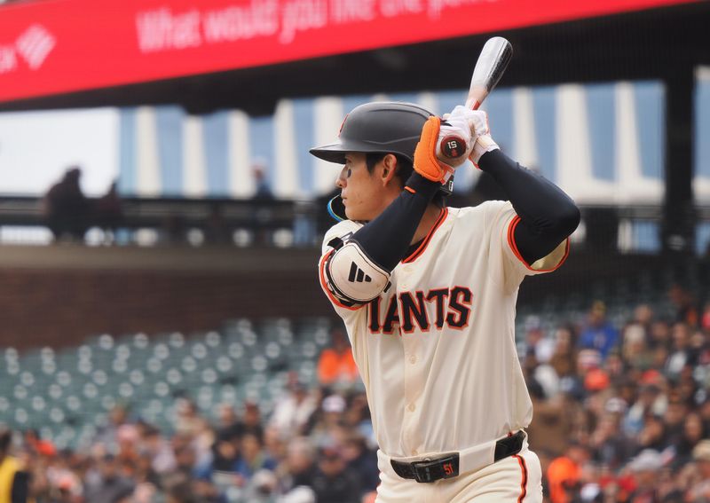 Apr 24, 2025; San Francisco, California, USA; San Francisco Giants center fielder Jung Hoo Lee (51) at bat during the first inning against the Milwaukee Brewers at Oracle Park. Mandatory Credit: Kelley L Cox-Imagn Images
