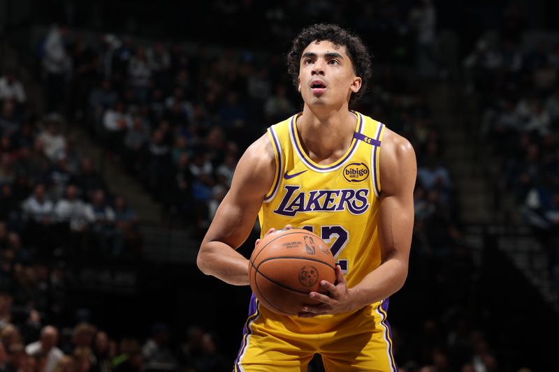 MINNEAPOLIS, MN -  DECEMBER 13:  Max Christie #12 of the Los Angeles Lakers shoots a free throw during the game against the Minnesota Timberwolves on December 13, 2024 at Target Center in Minneapolis, Minnesota. NOTE TO USER: User expressly acknowledges and agrees that, by downloading and or using this Photograph, user is consenting to the terms and conditions of the Getty Images License Agreement. Mandatory Copyright Notice: Copyright 2024 NBAE (Photo by David Sherman/NBAE via Getty Images)