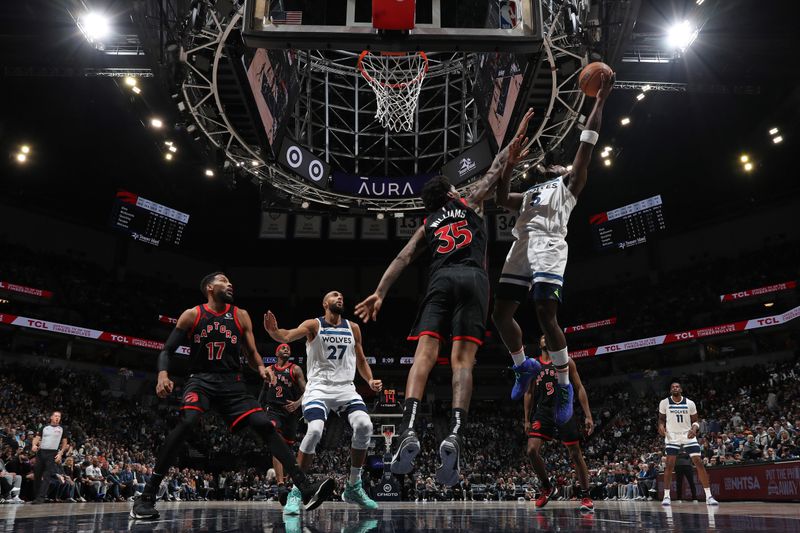 MINNEAPOLIS, MN -  APRIL 3: Anthony Edwards #5 of the Minnesota Timberwolves shoots the ball during the game against the Toronto Raptors  on April 3, 2024 at Target Center in Minneapolis, Minnesota. NOTE TO USER: User expressly acknowledges and agrees that, by downloading and or using this Photograph, user is consenting to the terms and conditions of the Getty Images License Agreement. Mandatory Copyright Notice: Copyright 2024 NBAE (Photo by Jordan Johnson/NBAE via Getty Images)