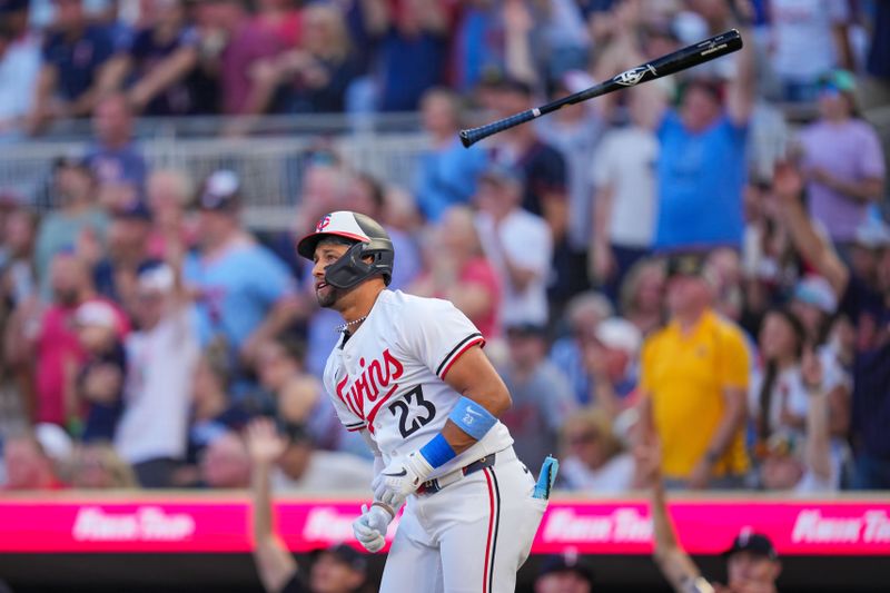 Aug 12, 2024; Minneapolis, Minnesota, USA; Minnesota Twins third base Royce Lewis (23) hits a home run against the Kansas City Royals in the second inning at Target Field. Mandatory Credit: Brad Rempel-USA TODAY Sports