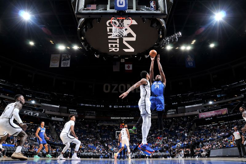 ORLANDO, FL - FEBRUARY 27: Wendell Carter Jr. #34 of the Orlando Magic shoots the ball during the game against the Brooklyn Nets on February 27, 2024 at the Kia Center in Orlando, Florida. NOTE TO USER: User expressly acknowledges and agrees that, by downloading and or using this photograph, User is consenting to the terms and conditions of the Getty Images License Agreement. Mandatory Copyright Notice: Copyright 2024 NBAE (Photo by Fernando Medina/NBAE via Getty Images)