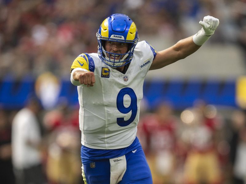 Los Angeles Rams quarterback Matthew Stafford (9) celebrates the team's touchdown during an NFL football game against the San Francisco 49ers, Sunday, Sept. 22, 2024, in Inglewood, Calif. (AP Photo/Kyusung Gong)