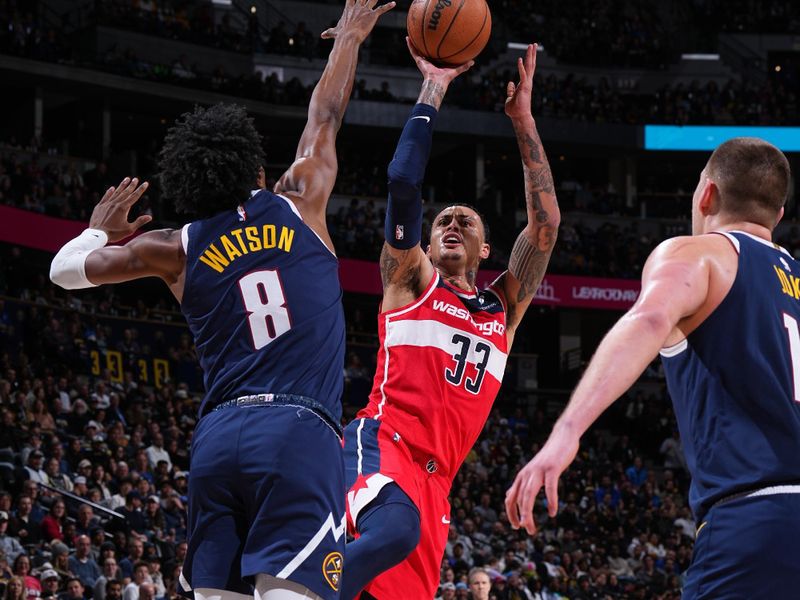 DENVER, CO - FEBRUARY 22: Kyle Kuzma #33 of the Washington Wizards shoots the ball during the game against the Denver Nuggets on February 22, 2024 at the Ball Arena in Denver, Colorado. NOTE TO USER: User expressly acknowledges and agrees that, by downloading and/or using this Photograph, user is consenting to the terms and conditions of the Getty Images License Agreement. Mandatory Copyright Notice: Copyright 2024 NBAE (Photo by Garrett Ellwood/NBAE via Getty Images)