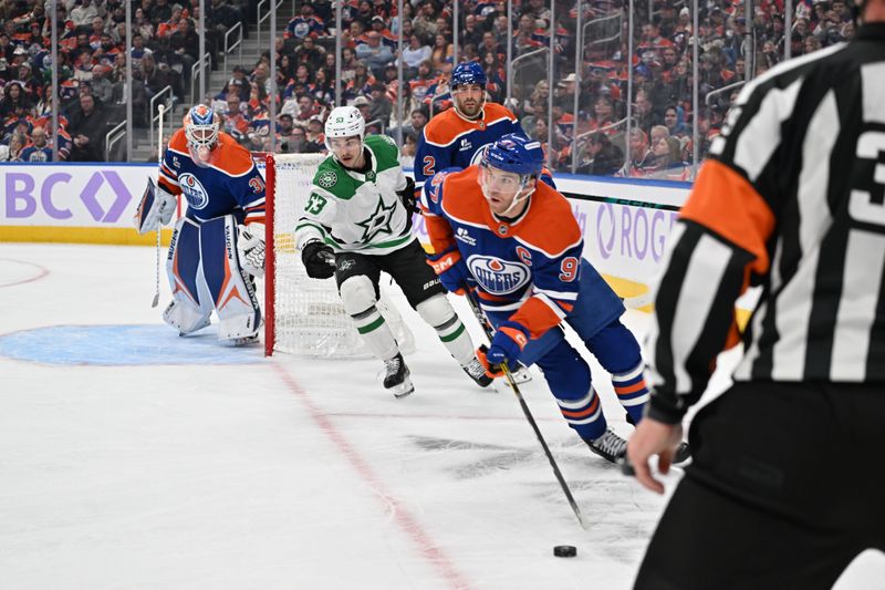 Nov 25, 2025; Edmonton, Alberta, CAN;  Edmonton Oilers centre  Connor McDavid (97) skates with the puck as Dallas Stars centre Wyatt Johnson (53) and Edmonton Oilers goalie Calvin Pickard (30) looks on during the second period at Rogers Place. Mandatory Credit: Walter Tychnowicz-Imagn Images