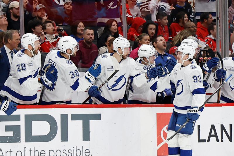 Mar 1, 2025; Washington, District of Columbia, USA; Tampa Bay Lightning center Gage Goncalves (93) celebrates with teammates after scoring a goal against the Washington Capitals in the third period at Capital One Arena. Mandatory Credit: Geoff Burke-Imagn Images