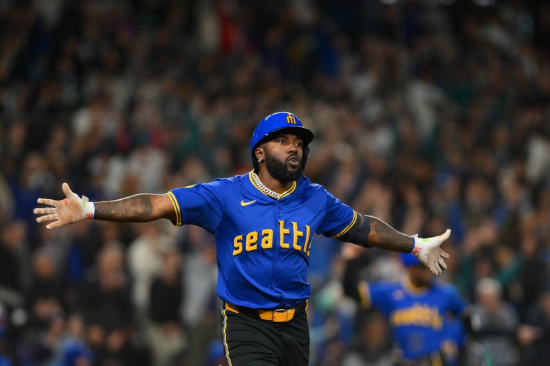 Sep 14, 2024; Seattle, Washington, USA; Seattle Mariners designated hitter Randy Arozarena (56) celebrates after hitting a walk-off single against the Texas Rangers during the ninth inning at T-Mobile Park. Mandatory Credit: Steven Bisig-Imagn Images