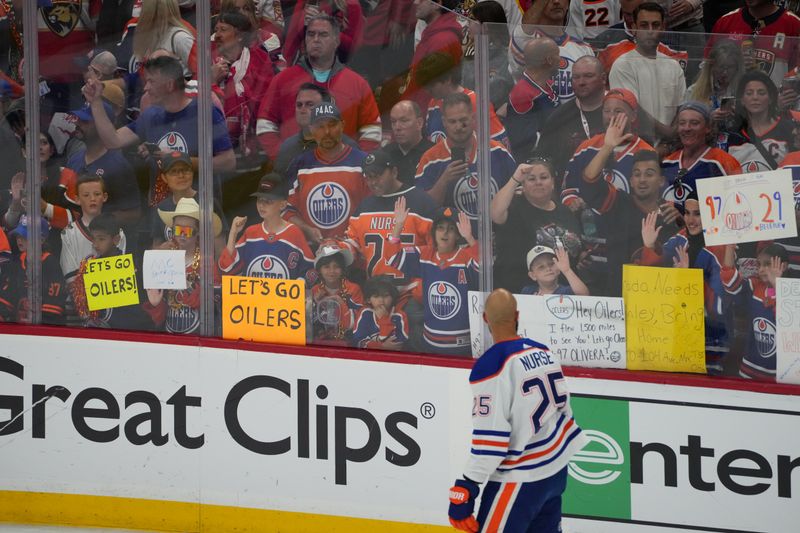 Jun 24, 2024; Sunrise, Florida, USA; Edmonton Oilers fans during warm up prior to the game between Florida Panthers and Edmonton Oilers in game seven of the 2024 Stanley Cup Final at Amerant Bank Arena. Mandatory Credit: Jim Rassol-USA TODAY Sports