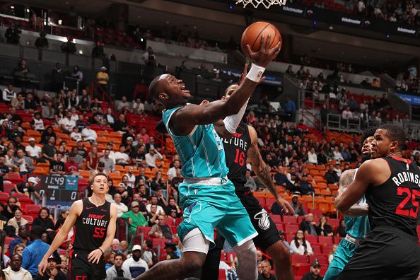 MIAMI, FL - DECEMBER 13: Terry Rozier #3 of the Charlotte Hornets drives to the basket during the game against the Miami Heat on December 13, 2023 at Kaseya Center in Miami, Florida. NOTE TO USER: User expressly acknowledges and agrees that, by downloading and or using this Photograph, user is consenting to the terms and conditions of the Getty Images License Agreement. Mandatory Copyright Notice: Copyright 2023 NBAE (Photo by Issac Baldizon/NBAE via Getty Images)