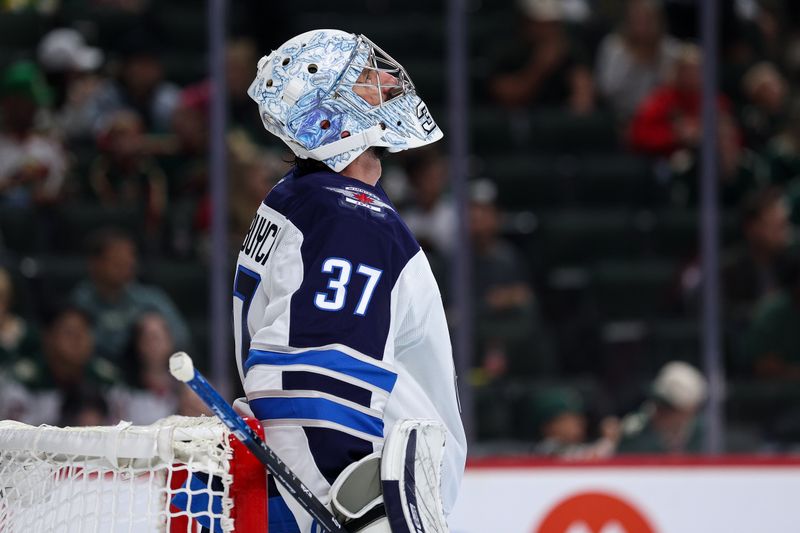 Sep 30, 2025; Saint Paul, Minnesota, USA; Winnipeg Jets goaltender Connor Hellebuyck (37) looks on during the second period against the Minnesota Wild at Grand Casino Arena. Mandatory Credit: Matt Krohn-Imagn Images
