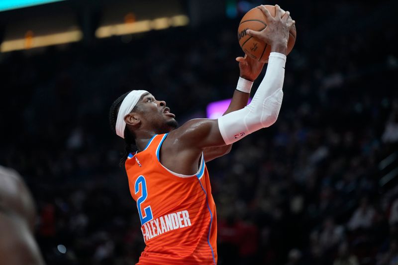 PORTLAND, OREGON - NOVEMBER 01: Shai Gilgeous-Alexander #2 of the Oklahoma City Thunder drives to the basket during the first half against the Portland Trail Blazers at Moda Center on November 01, 2024 in Portland, Oregon. NOTE TO USER: User expressly acknowledges and agrees that, by downloading and or using this photograph, User is consenting to the terms and conditions of the Getty Images License Agreement. (Photo by Soobum Im/Getty Images)