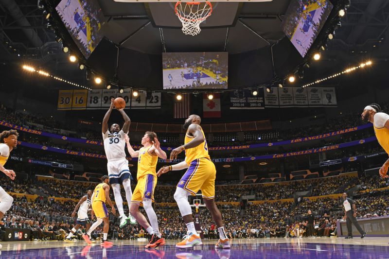 LOS ANGELES, CA - OCTOBER 22: Julius Randle #30 of the Minnesota Timberwolves shoots the ball during the game against the Los Angeles Lakers on October 22, 2024 at Crypto.Com Arena in Los Angeles, California. NOTE TO USER: User expressly acknowledges and agrees that, by downloading and/or using this Photograph, user is consenting to the terms and conditions of the Getty Images License Agreement. Mandatory Copyright Notice: Copyright 2024 NBAE (Photo by Adam Pantozzi/NBAE via Getty Images)