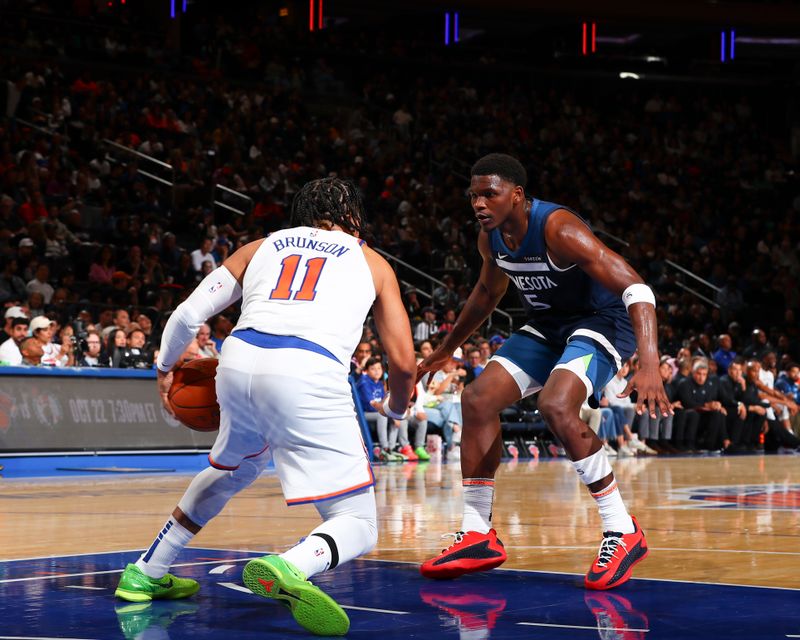 NEW YORK, NY - OCTOBER 13: Jalen Brunson #11 of the New York Knicks is defended by Anthony Edwards #5 of the Minnesota Timberwolves during the game on October 13, 2024 at Madison Square Garden in New York City, New York.  NOTE TO USER: User expressly acknowledges and agrees that, by downloading and or using this photograph, User is consenting to the terms and conditions of the Getty Images License Agreement. Mandatory Copyright Notice: Copyright 2024 NBAE  (Photo by David L. Nemec/NBAE via Getty Images)