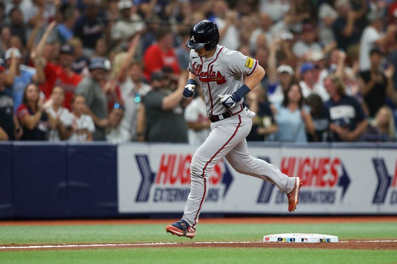 Jul 8, 2023; St. Petersburg, Florida, USA; Atlanta Braves catcher Sean Murphy (12) runs the bases hitting a three run home run against the Tampa Bay Rays in the fourth inning at Tropicana Field. Mandatory Credit: Nathan Ray Seebeck-USA TODAY Sports