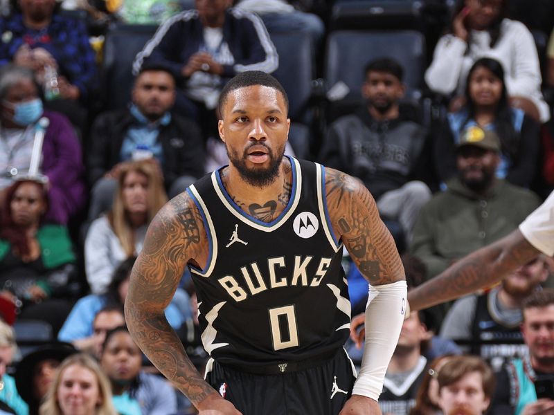 MEMPHIS, TN - FEBRUARY 15: Damian Lillard #0 of the Milwaukee Bucks looks on during the game against the Memphis Grizzlies on February 15, 2024 at FedExForum in Memphis, Tennessee. NOTE TO USER: User expressly acknowledges and agrees that, by downloading and or using this photograph, User is consenting to the terms and conditions of the Getty Images License Agreement. Mandatory Copyright Notice: Copyright 2024 NBAE (Photo by Stephen Gosling/NBAE via Getty Images)