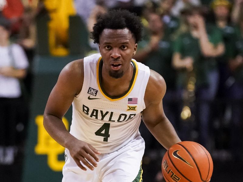 Feb 13, 2023; Waco, Texas, USA; Baylor Bears guard LJ Cryer (4) runs the offense against the West Virginia Mountaineers during the second half at Ferrell Center. Mandatory Credit: Raymond Carlin III-USA TODAY Sports