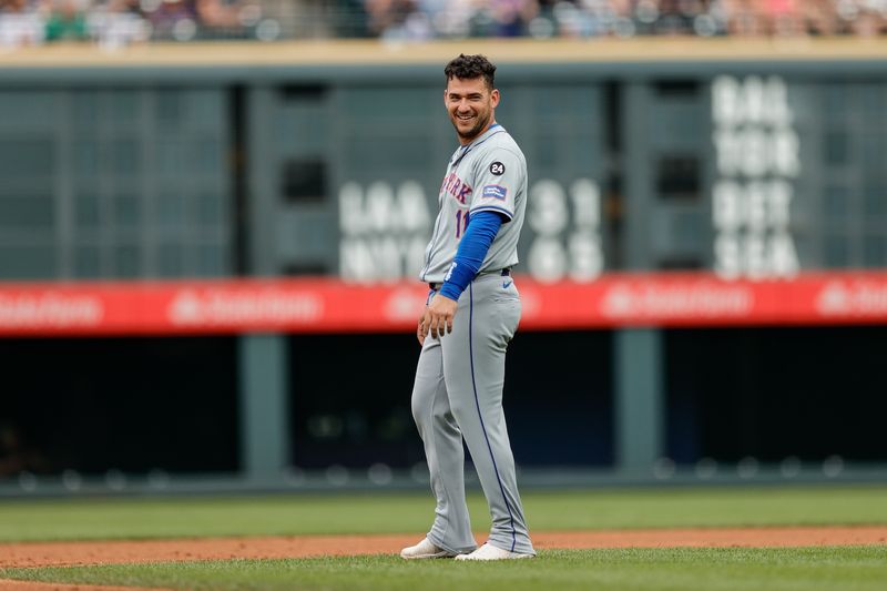 Aug 8, 2024; Denver, Colorado, USA; New York Mets second baseman Jose Iglesias (11) reacts in the middle of the second inning against the Colorado Rockies at Coors Field. Mandatory Credit: Isaiah J. Downing-USA TODAY Sports