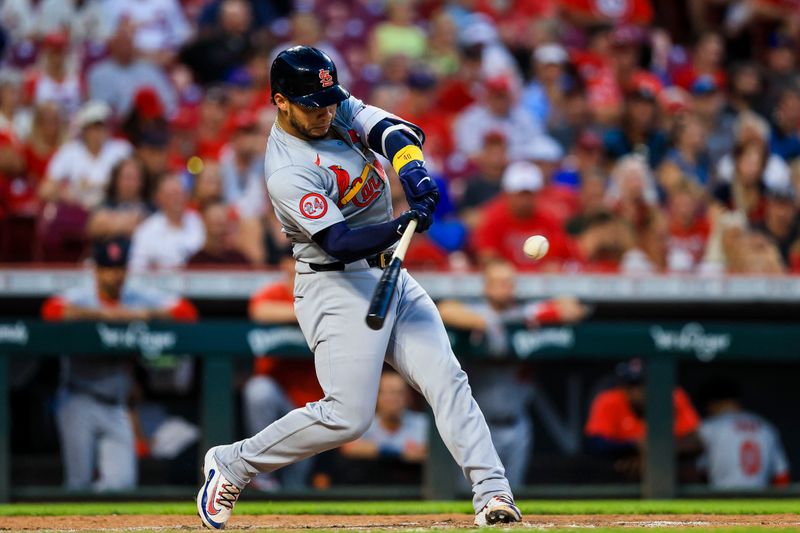 Aug 14, 2024; Cincinnati, Ohio, USA; St. Louis Cardinals catcher Willson Contreras (40) hits a single against the Cincinnati Reds in the sixth inning at Great American Ball Park. Mandatory Credit: Katie Stratman-USA TODAY Sports