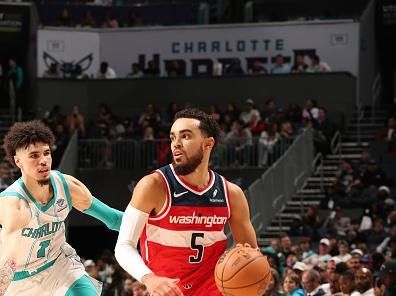 CHARLOTTE, NC - NOVEMBER 22: Tyus Jones #5 of the Washington Wizards drives to the basket during the game against the Charlotte Hornets on November 22, 2023 at Spectrum Center in Charlotte, North Carolina. NOTE TO USER: User expressly acknowledges and agrees that, by downloading and or using this photograph, User is consenting to the terms and conditions of the Getty Images License Agreement. Mandatory Copyright Notice: Copyright 2023 NBAE (Photo by Kent Smith/NBAE via Getty Images)