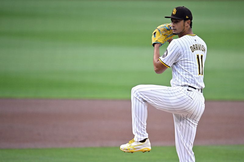 Apr 30, 2024; San Diego, California, USA; San Diego Padres starting pitcher Yu Darvish (11) throws a pitch against the Cincinnati Reds during the first inning at Petco Park. Mandatory Credit: Orlando Ramirez-USA TODAY Sports