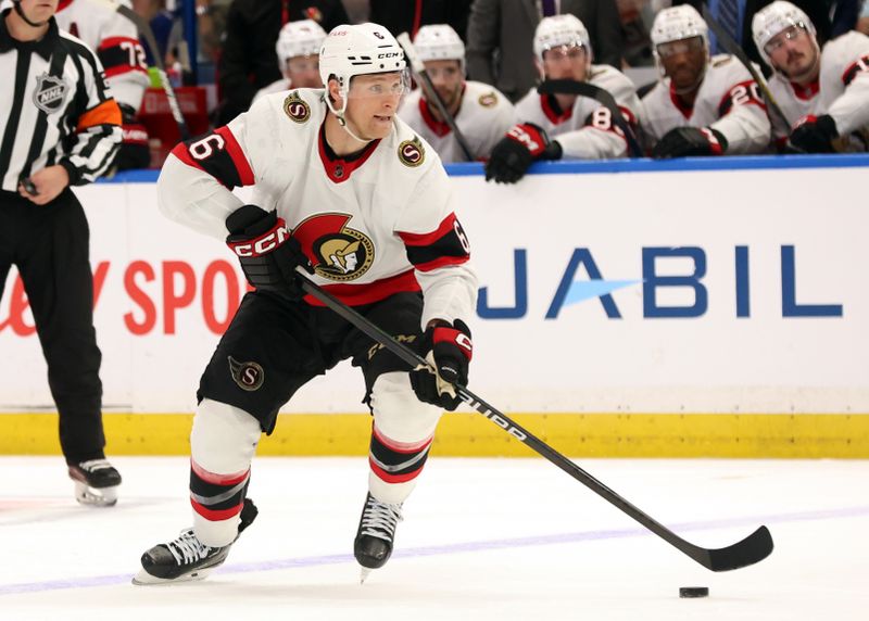 Apr 11, 2024; Tampa, Florida, USA; Ottawa Senators defenseman Jakob Chychrun (6) skates with the puck against the Tampa Bay Lightning during the second period at Amalie Arena. Mandatory Credit: Kim Klement Neitzel-USA TODAY Sports