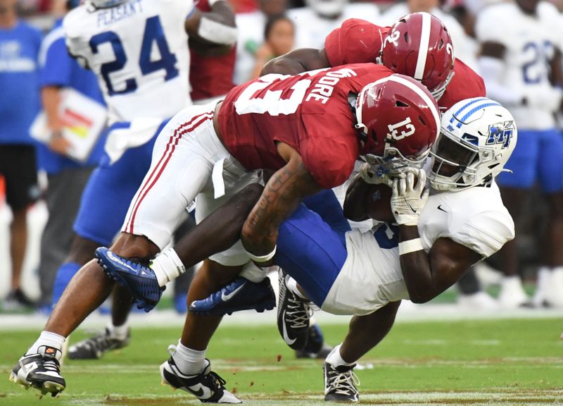 Middle Tennessee Blue Raiders Face Off Against Alabama Crimson Tide at Bryant-Denny Stadium in C...