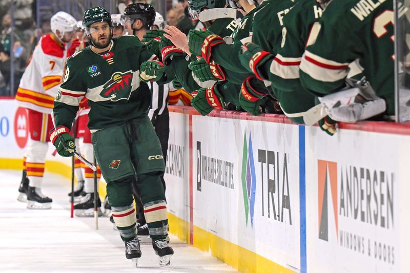 Jan 29, 2026; Saint Paul, Minnesota, USA;  Minnesota Wild forward Vinnie Hinostroza (18) celebrates his goal against the Calgary Flames during the first period at Grand Casino Arena. Mandatory Credit: Nick Wosika-Imagn Images