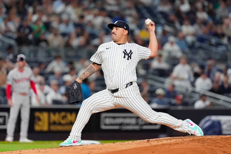 Sep 12, 2024; Bronx, New York, USA; New York Yankees pitcher Nestor Cortes (65) delivers a pitch against the Boston Red Sox during the second inning at Yankee Stadium. Mandatory Credit: Gregory Fisher-Imagn Images