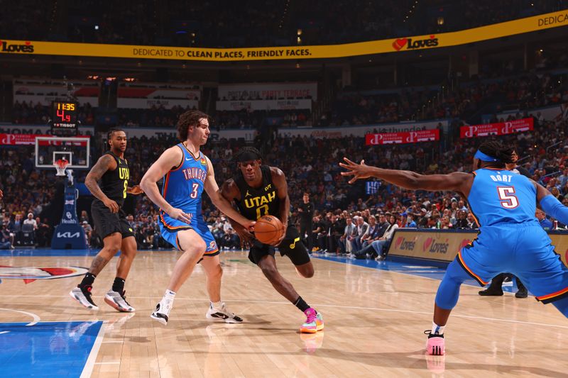 OKLAHOMA CITY, OK - MARCH 20: Taylor Hendricks #0 of the Utah Jazz drives to the basket during the game against the Oklahoma City Thunder on March 20, 2024 at Paycom Arena in Oklahoma City, Oklahoma. NOTE TO USER: User expressly acknowledges and agrees that, by downloading and or using this photograph, User is consenting to the terms and conditions of the Getty Images License Agreement. Mandatory Copyright Notice: Copyright 2024 NBAE (Photo by Zach Beeker/NBAE via Getty Images)