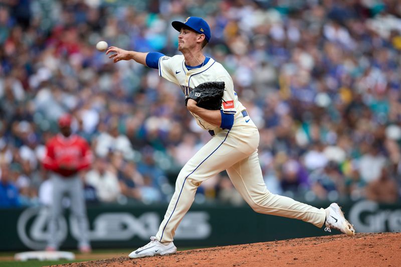 Sep 14, 2025; Seattle, Washington, USA; Seattle Mariners pitcher Emerson Hancock (26) throws against the Los Angeles Angels during the seventh inning at T-Mobile Park. Mandatory Credit: John Froschauer-Imagn Images