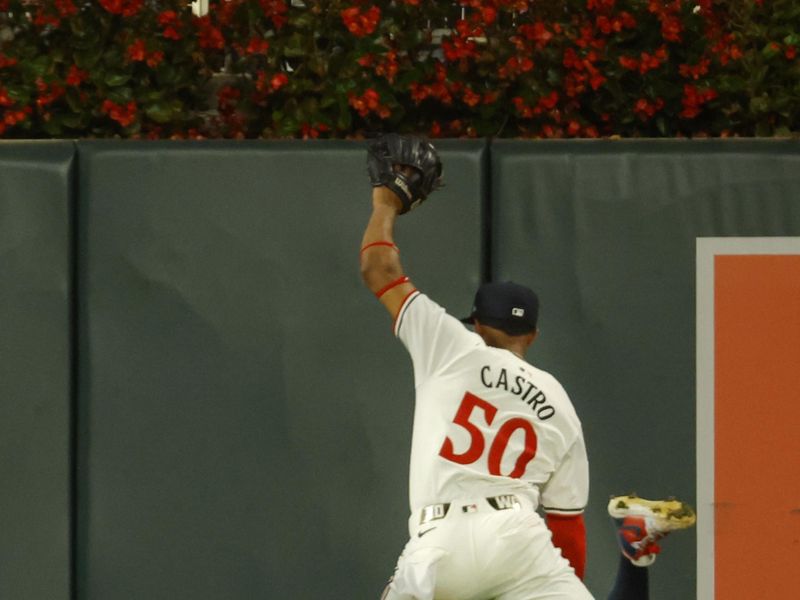 Sep 28, 2024; Minneapolis, Minnesota, USA; Minnesota Twins shortstop Willi Castro (50) can not reach a double by Baltimore Orioles second baseman Jackson Holliday (not pictured) in the fifth inning at Target Field. Mandatory Credit: Bruce Kluckhohn-Imagn Images