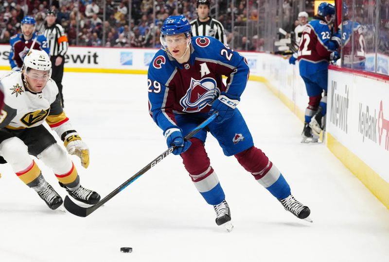 Jan 10, 2024; Denver, Colorado, USA; Colorado Avalanche center Nathan MacKinnon (29) skates past Vegas Golden Knights center Paul Cotter (43) in the second period at Ball Arena. Mandatory Credit: Ron Chenoy-USA TODAY Sports