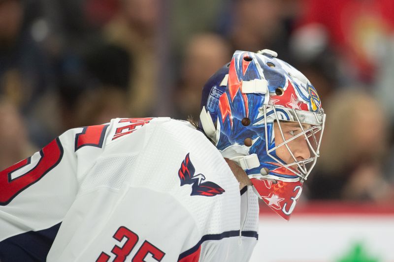 Oct 18, 2023; Ottawa, Ontario, CAN; Washington Capitals goalie Darcy Kuemper (35) looks up the ice prior to the start of the first period against the Ottawa Senators at the Canadian Tire Centre. Mandatory Credit: Marc DesRosiers-USA TODAY Sports