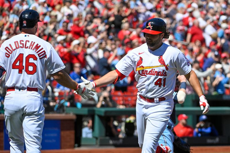 Apr 2, 2023; St. Louis, Missouri, USA;  St. Louis Cardinals left fielder Alec Burleson (41) celebrates with first baseman Paul Goldschmidt (46) after hitting a solo home run against the Toronto Blue Jays during the first inning at Busch Stadium. Mandatory Credit: Jeff Curry-USA TODAY Sports