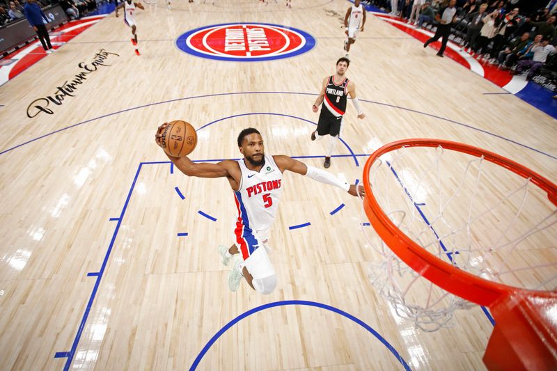 DETROIT, MI - JANUARY 06: Malik Beasley #5 of the Detroit Pistons dunks the ball during the game against the Portland Trail Blazers on January 06, 2025 at Little Caesars Arena in Detroit, Michigan. NOTE TO USER: User expressly acknowledges and agrees that, by downloading and/or using this photograph, User is consenting to the terms and conditions of the Getty Images License Agreement. Mandatory Copyright Notice: Copyright 2024 NBAE (Photo by Brian Sevald/NBAE via Getty Images)