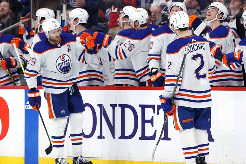 Mar 26, 2024; Winnipeg, Manitoba, CAN; Edmonton Oilers center Leon Draisaitl (29) celebrates his second period against the Winnipeg Jets at Canada Life Centre. Mandatory Credit: James Carey Lauder-USA TODAY Sports