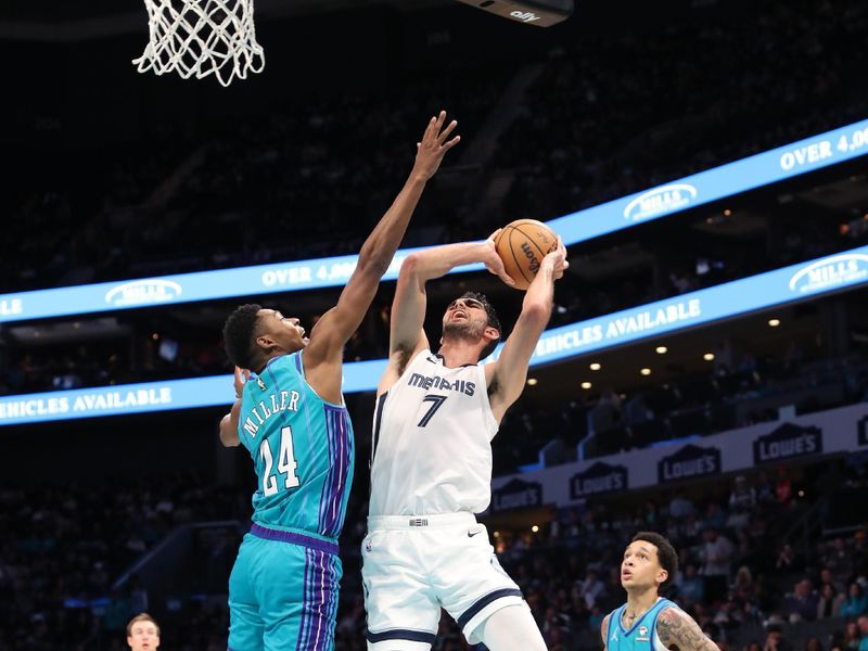 CHARLOTTE, NC - FEBRUARY 10:  Santi Aldama #7 of the Memphis Grizzlies goes to the basket during the game on February 10, 2024 at Spectrum Center in Charlotte, North Carolina. NOTE TO USER: User expressly acknowledges and agrees that, by downloading and or using this photograph, User is consenting to the terms and conditions of the Getty Images License Agreement.  Mandatory Copyright Notice:  Copyright 2024 NBAE (Photo by Brock Williams-Smith/NBAE via Getty Images)