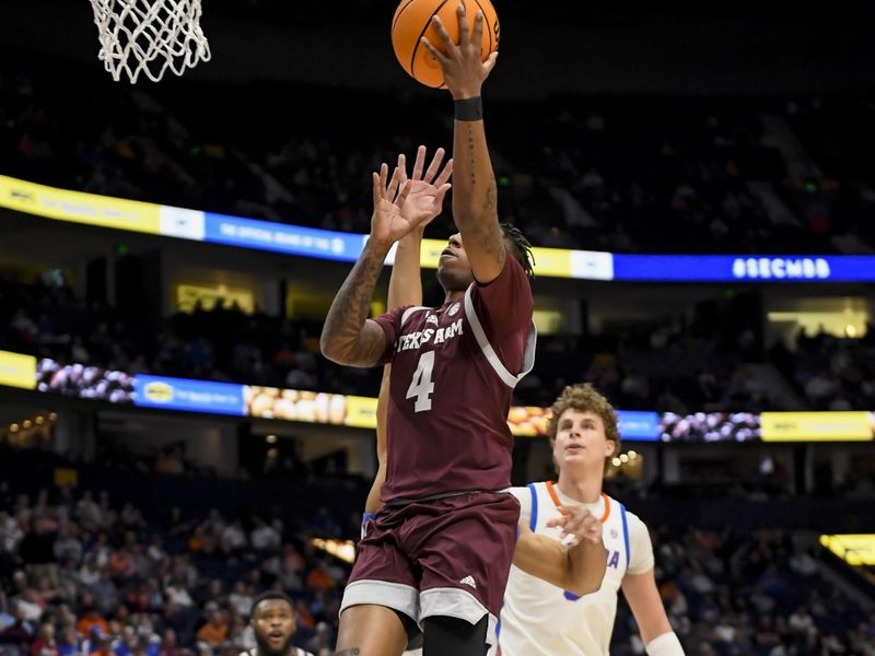 Mar 16, 2024; Nashville, TN, USA;  Texas A&M Aggies guard Wade Taylor IV (4) lays the ball in against the Florida Gators during the first half at Bridgestone Arena. Mandatory Credit: Steve Roberts-USA TODAY Sports