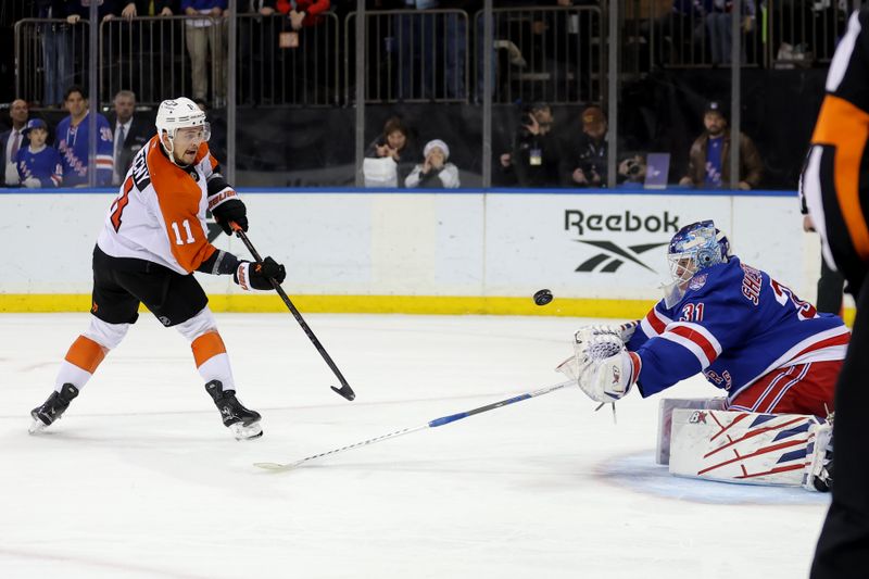 Dec 20, 2025; New York, New York, USA; Philadelphia Flyers right wing Travis Konecny (11) misses his shot against New York Rangers goaltender Igor Shesterkin (31) during the shootout at Madison Square Garden. Mandatory Credit: Brad Penner-Imagn Images