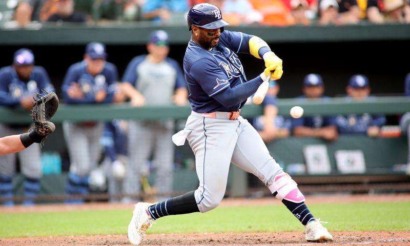 Jun 2, 2024; Baltimore, Maryland, USA; Tampa Bay Rays outfielder Randy Arozarena (56) swings during the ninth inning against the Baltimore Orioles at Oriole Park at Camden Yards. Mandatory Credit: Daniel Kucin Jr.-USA TODAY Sports