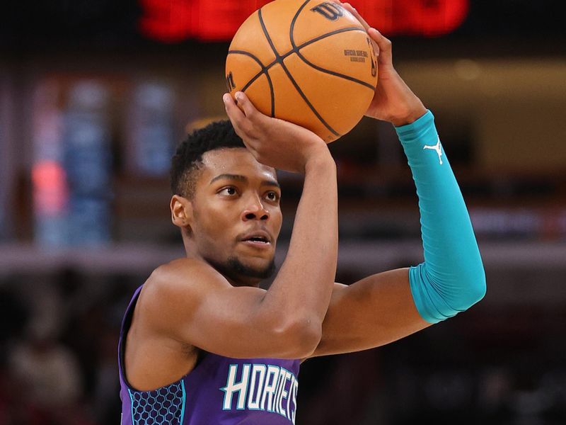 CHICAGO, ILLINOIS - DECEMBER 06: Brandon Miller #24 of the Charlotte Hornets shoots a three pointer against the Chicago Bulls during the second half at the United Center on December 06, 2023 in Chicago, Illinois. NOTE TO USER: User expressly acknowledges and agrees that, by downloading and or using this photograph, User is consenting to the terms and conditions of the Getty Images License Agreement.  (Photo by Michael Reaves/Getty Images)