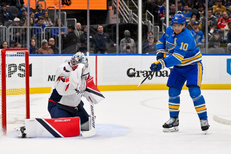 Nov 9, 2024; St. Louis, Missouri, USA;  Washington Capitals goaltender Logan Thompson (48) defends the net against St. Louis Blues center Brayden Schenn (10) during the second period at Enterprise Center. Mandatory Credit: Jeff Curry-Imagn Images