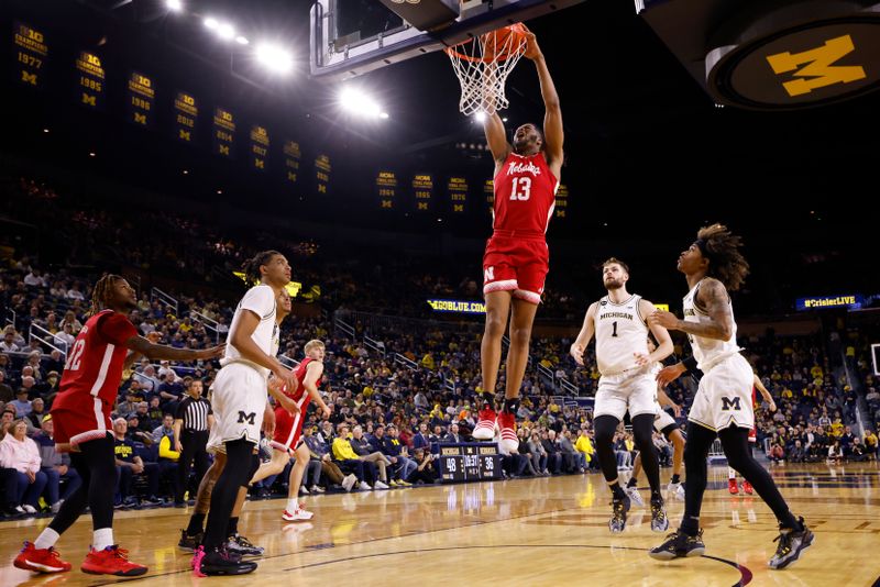 Feb 8, 2023; Ann Arbor, Michigan, USA;  Nebraska Cornhuskers forward Derrick Walker (13) dunks in the second half against the Michigan Wolverines at Crisler Center. Mandatory Credit: Rick Osentoski-USA TODAY Sports