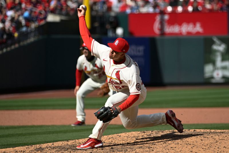 Apr 1, 2023; St. Louis, Missouri, USA; St. Louis Cardinals relief pitcher Ryan Helsley (56) pitches against the Toronto Blue Jays in the ninth inning at Busch Stadium. Mandatory Credit: Joe Puetz-USA TODAY Sports