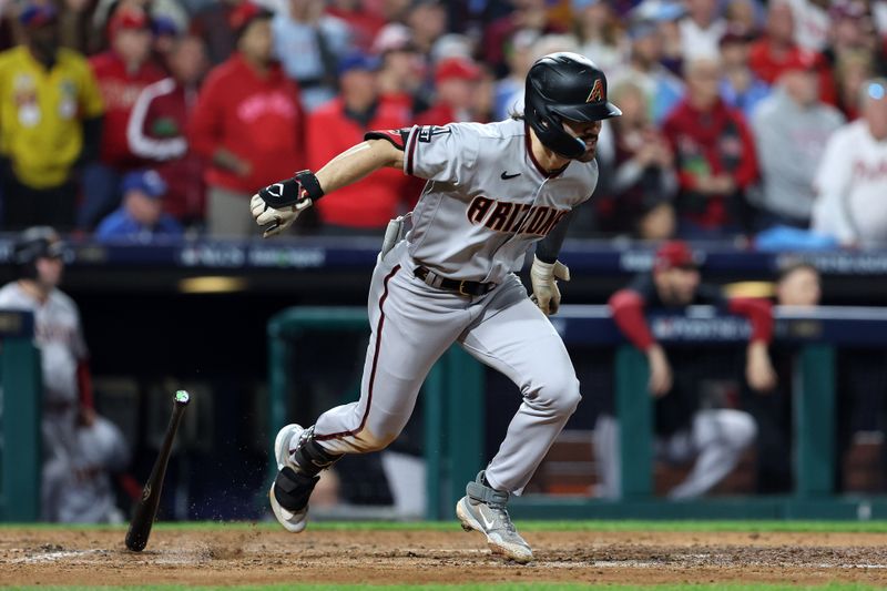 Oct 24, 2023; Philadelphia, Pennsylvania, USA; Arizona Diamondbacks left fielder Corbin Carroll (7) hits a RBI single against the Philadelphia Phillies in the fifth inning for game seven of the NLCS for the 2023 MLB playoffs at Citizens Bank Park. Mandatory Credit: Bill Streicher-USA TODAY Sports