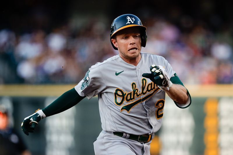 Jul 28, 2023; Denver, Colorado, USA; Oakland Athletics shortstop Nick Allen (2) runs to third on an RBI triple in the third inning against the Colorado Rockies at Coors Field. Mandatory Credit: Isaiah J. Downing-USA TODAY Sports