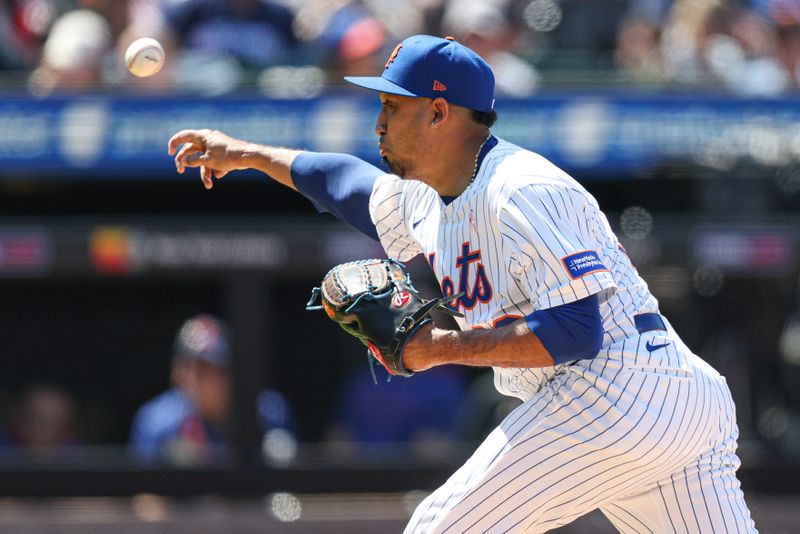 May 11, 2025; New York City, New York, USA; New York Mets relief pitcher Edwin Diaz (39) delivers a pitch during the ninth inning against the Chicago Cubs at Citi Field. Mandatory Credit: Vincent Carchietta-Imagn Images